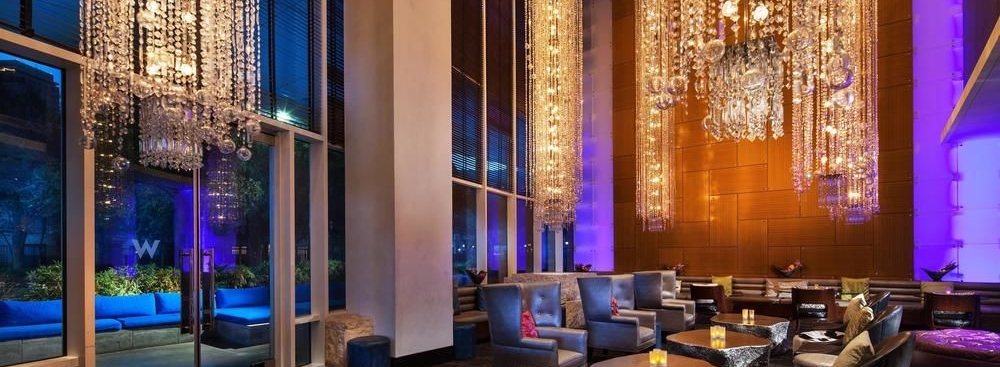 the living room bar is a huge bar at the w hotel dallas victory park with lots of space to lounge and mingle