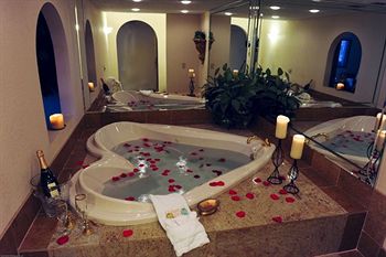 View of Heart Shaped Jacuzzi in Bathroom at Sterling Hotel