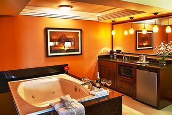 the jetted tub in the executive suite of the blue cypress hotel in arlington is big enough for 2 people