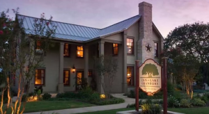 an outdoor view of the inn on lake granbury bed and breakfast in texas