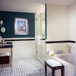the guest bathroom with deep soaking tub at the le meridien stoneleigh dallas