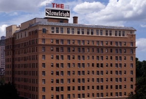 this is an outdoor view of the stoneleigh meridien hotel building in dallas