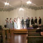a bride and groom getting married in the wedding chapel of lockheart gables b&b